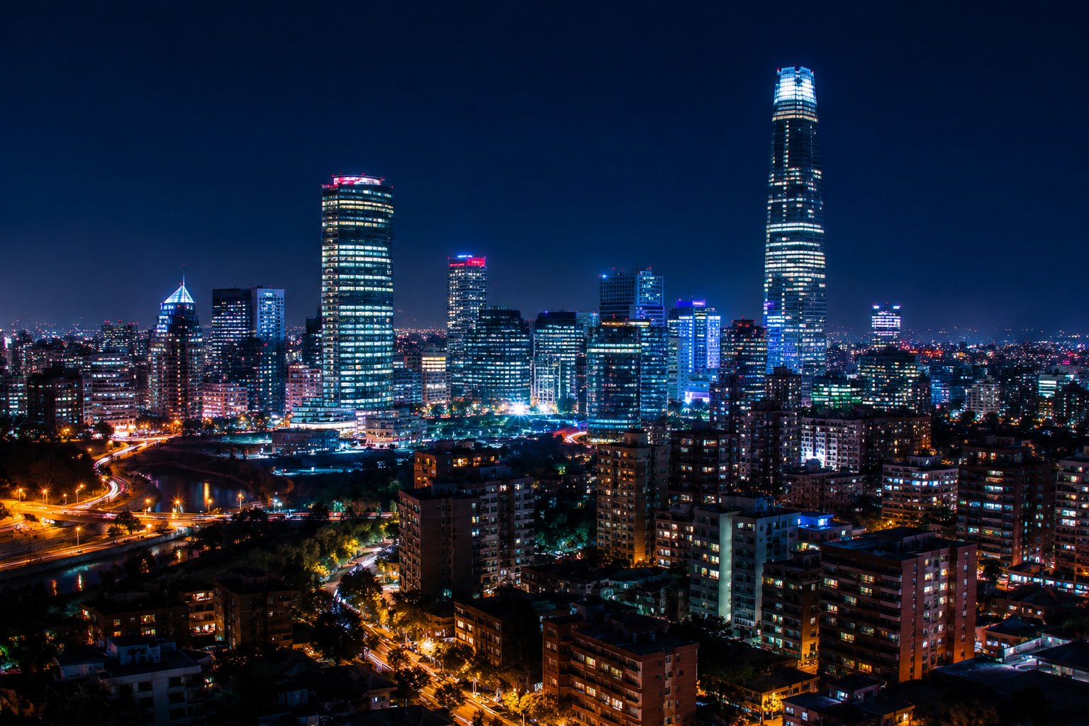Luces de ciudad de noche vistas con lente antirreflejo: nítidas y sin halos